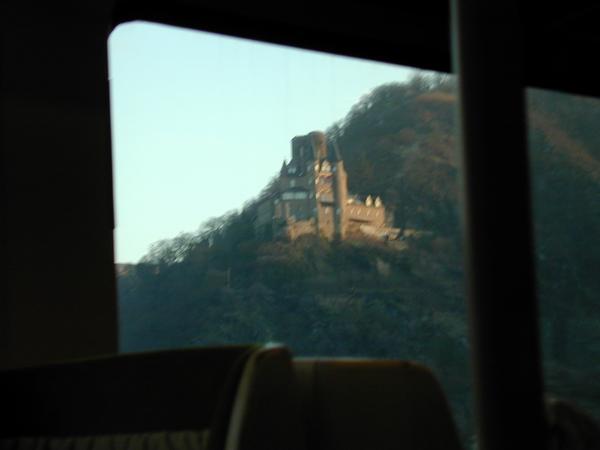 Castle on the rhine as seen from the train