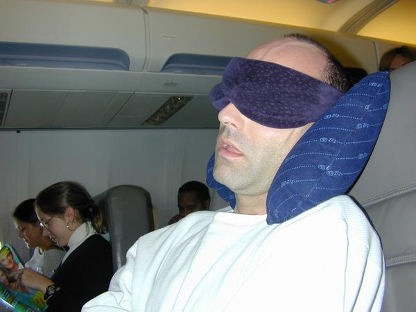 Lyle sleeping in the plane