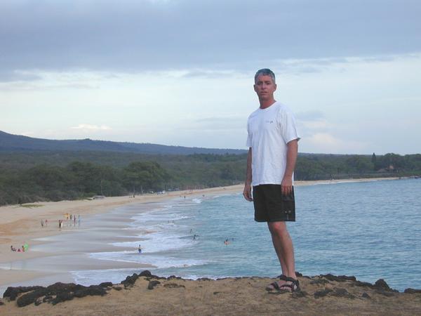 Kirk standing in front of big makena