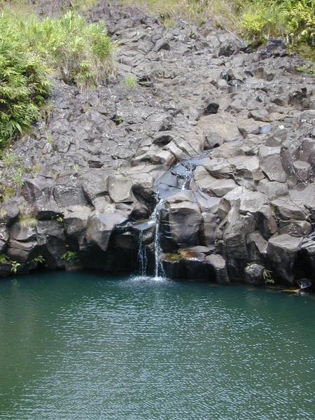 Water drippling into a lava pool