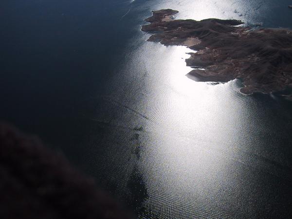 17 a finger against the glaring sun