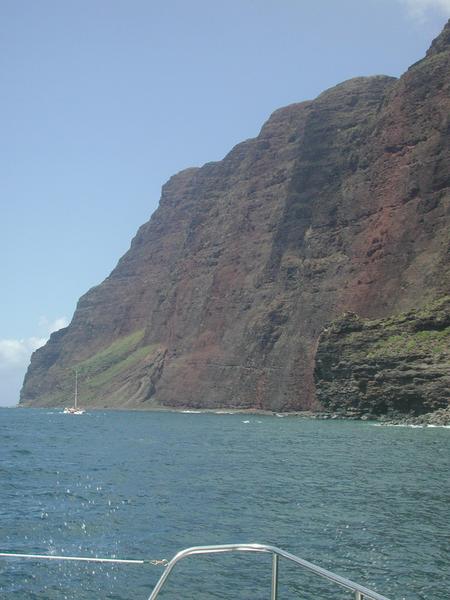 Boats steering towards the cliffs