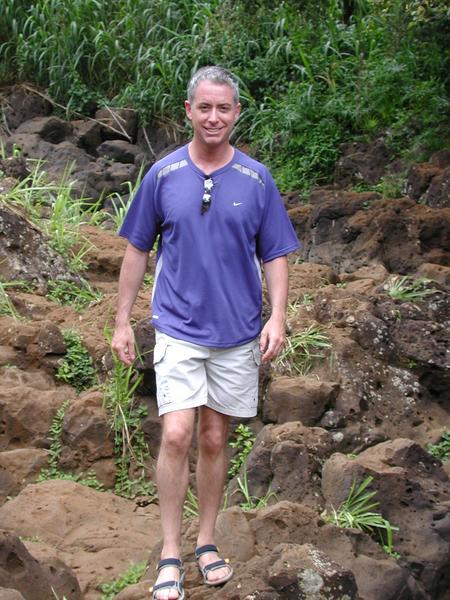 Kirk standing at kipu falls