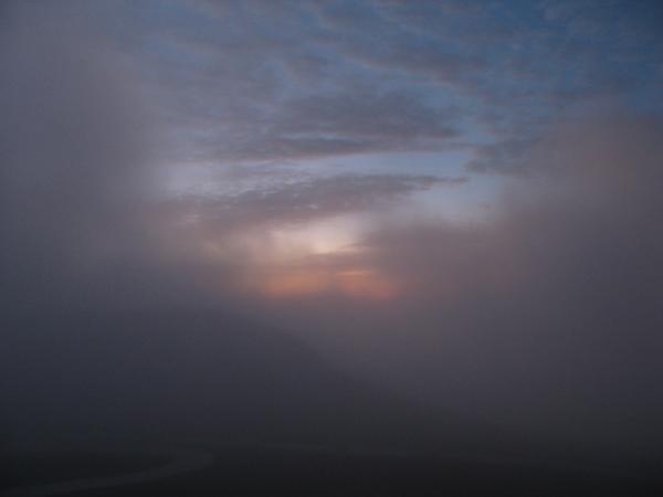 Almost dawn, the fog still shrowding the incipient sun