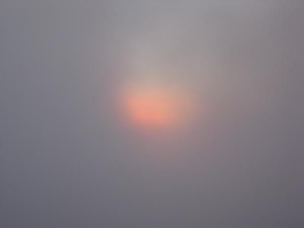 The fog covering the burning clouds