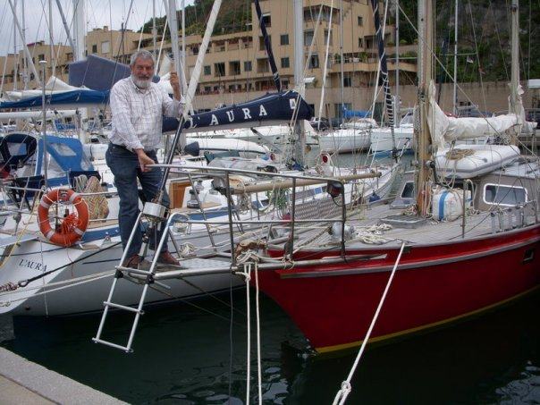 My father getting onto the piccolina his sail bo 20121216 1381067381