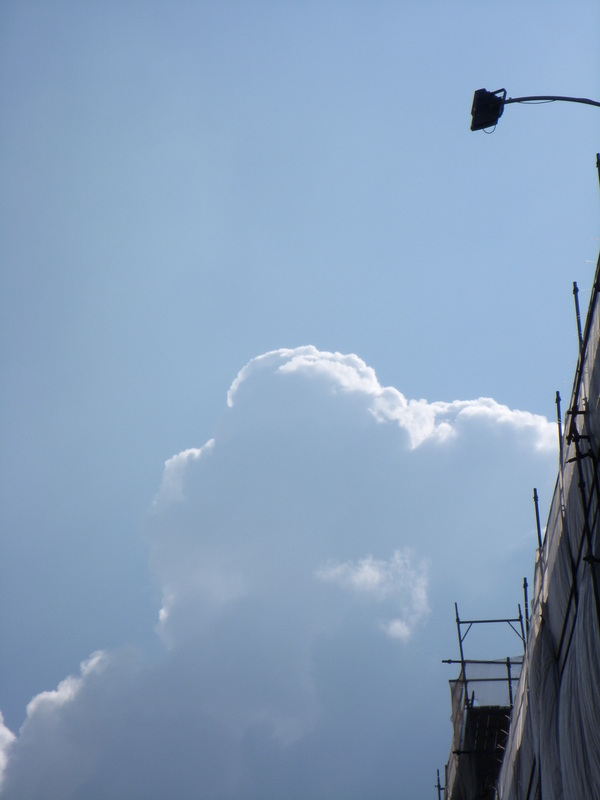Clouds crowining modern facade 20121212 1111566062