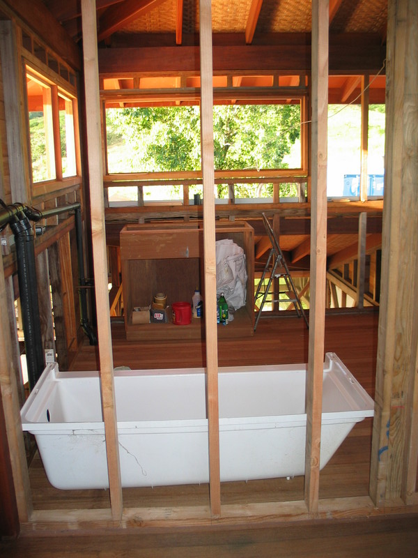 Upstairs, the tub