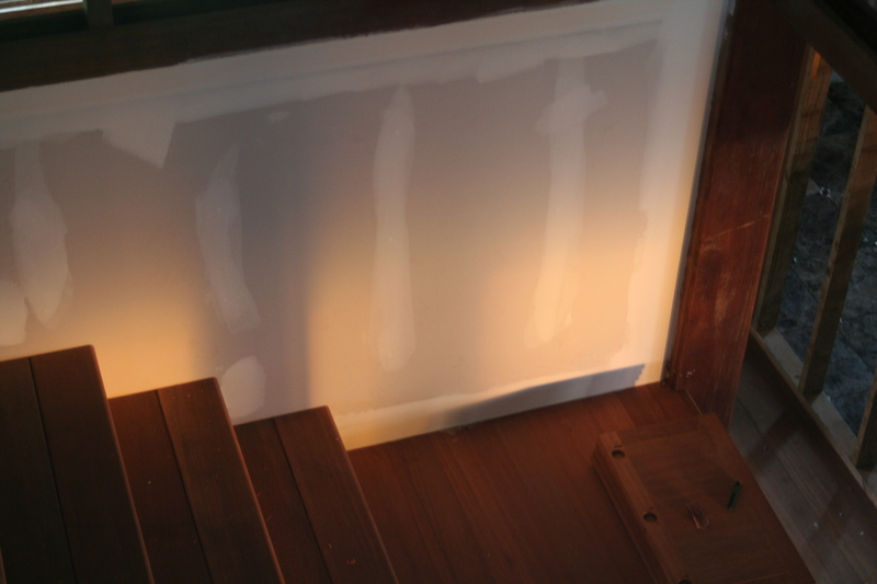 First morning light hitting the staircase and the new wall