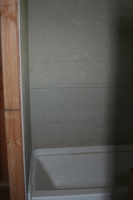 Tile backdrop in hilo bath